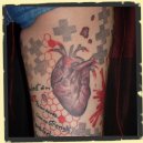 trash polka heart tattoo