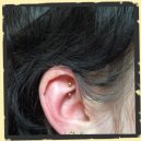 goudkleurige rook piercing