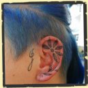 dotwork ear tattoo