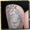 feminine lion tattoo