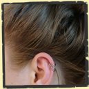 dubbele helix piercing